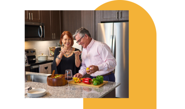 a man and woman in a kitchen