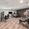 a fitness center and gym with a tv