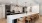 a kitchen with seating and appliances