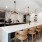 a kitchen with seating and appliances