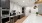 a clubhouse kitchen with appliances and seating