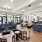 a clubhouse lounge with seating and a kitchen