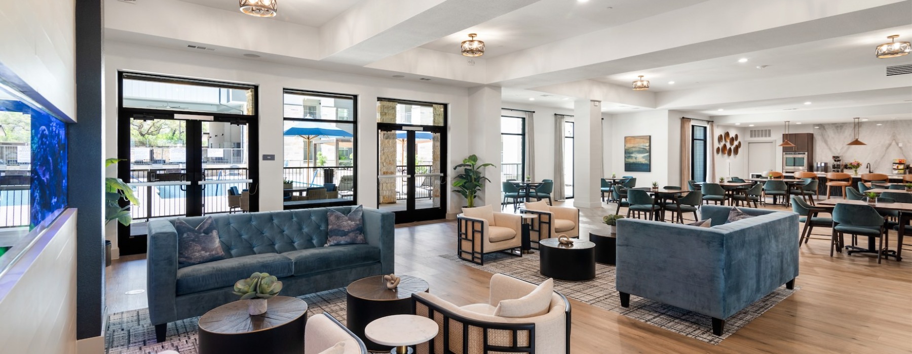 a clubhouse lounge with fish tank