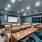 a theater with lounge seating and tv