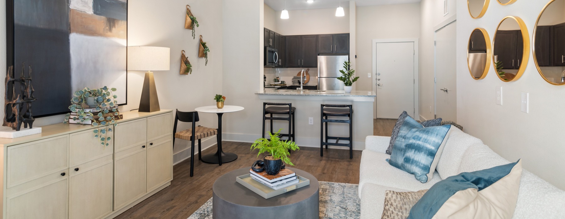 Kitchen and Living Room in Model Apartment Home