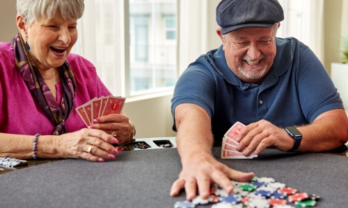 Two Community Members Playing Poker